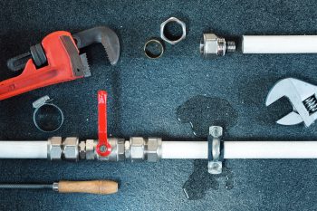 Water leak on a water pipe. Repair plumbing background.